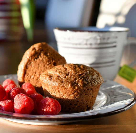 Muffin served with fruit and tea